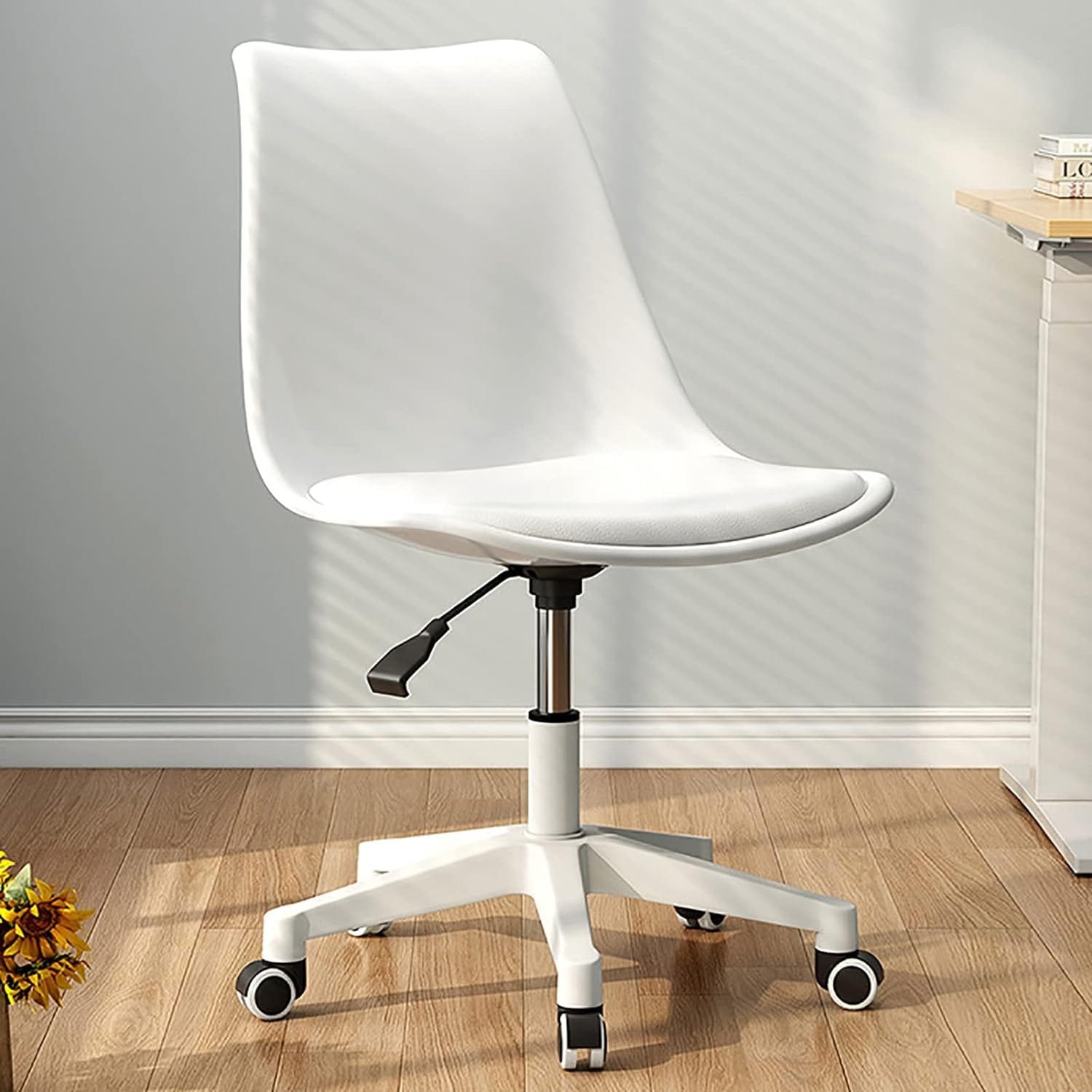 Swivel eames chair